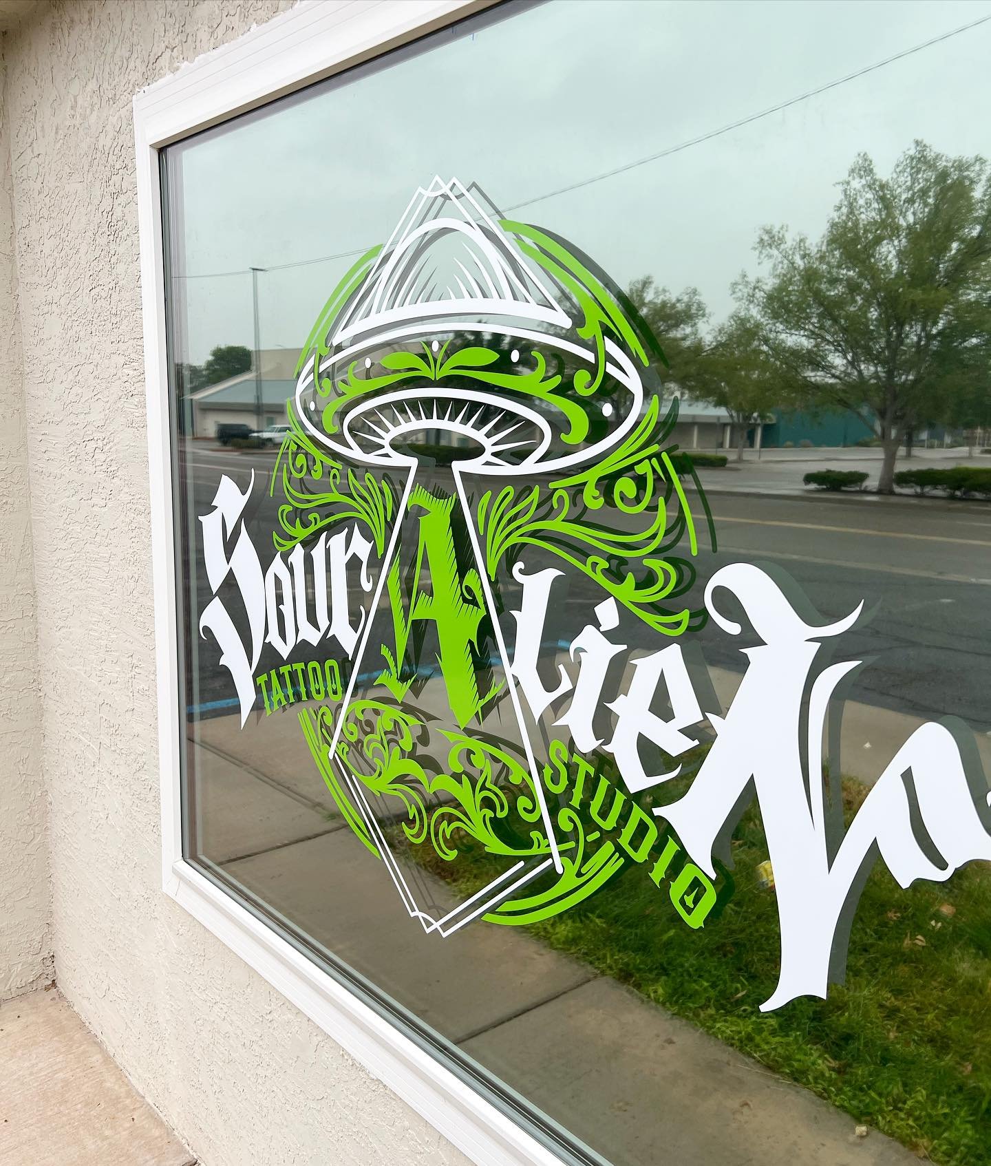Sour Alien Tattoo Studio custom window vinyl graphics