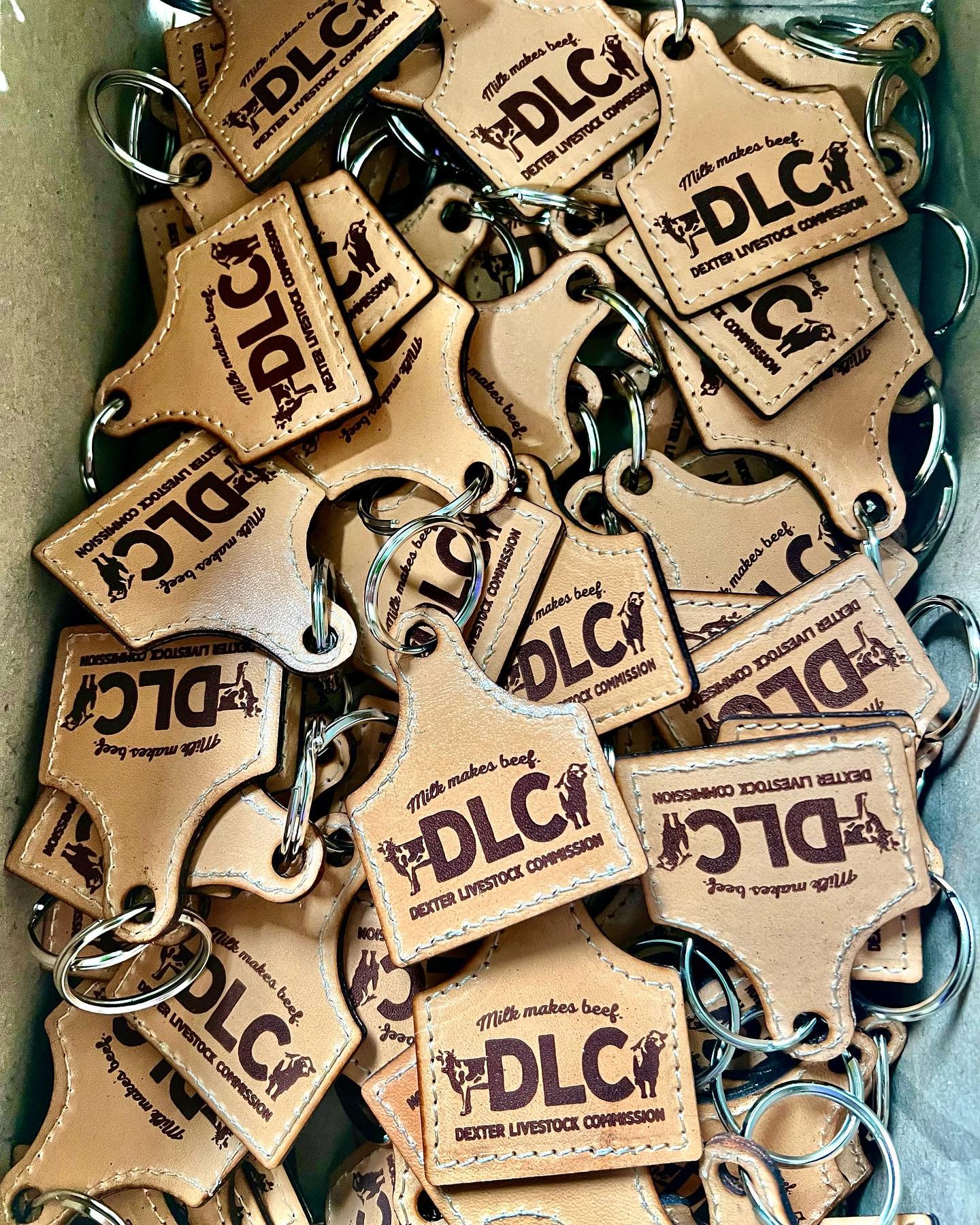 DLC Dexter Livestock Commission laser engraved leather keychains