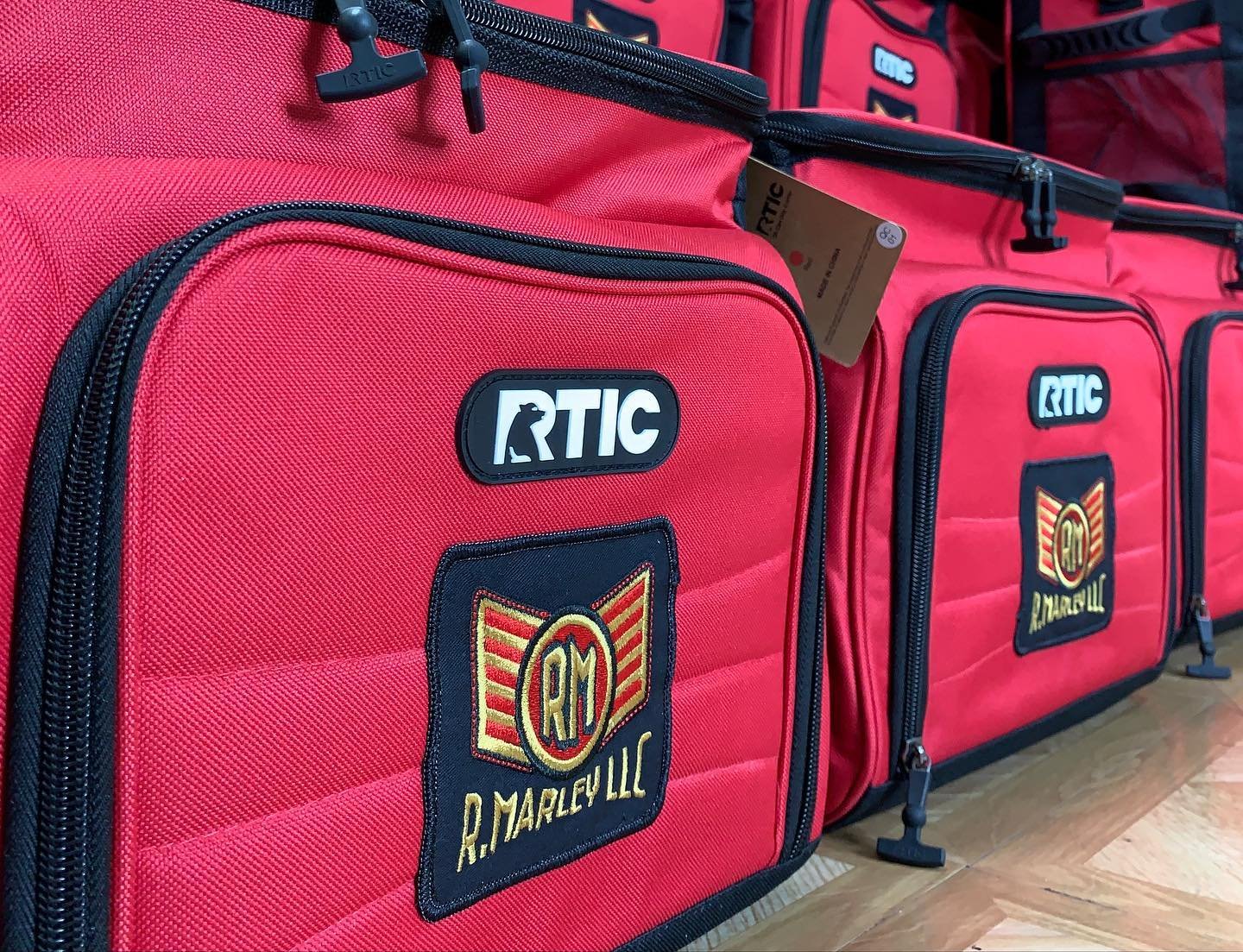 R. Marley LLC custom embroidered patch on RTIC cooler bags